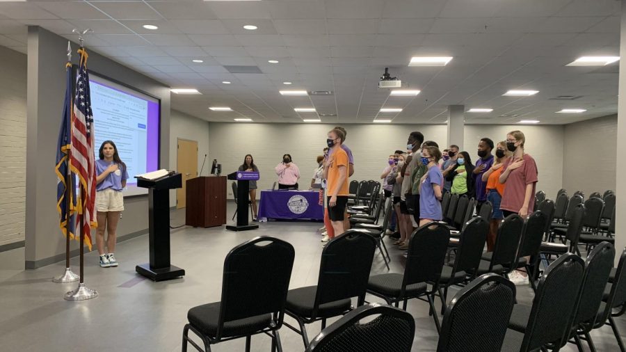 Northwestern State University of Louisianas Student Government Association stands for the pledge of allegiance at the beginning of Mondays meeting.
