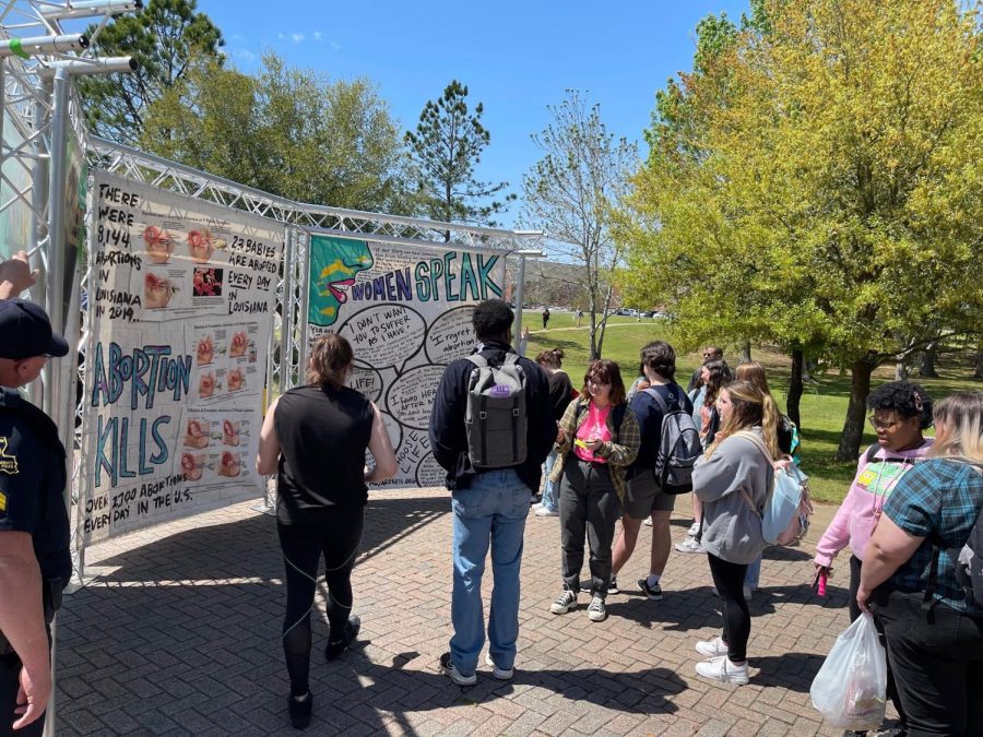 Students of Northwestern State University of Louisiana protest against a pro-life exhibition on Kyser Brickway.
