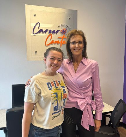 Kacy Young stands next to Rachel Cunningham, assistant director of Counseling and Career Services, at their new career center location on the first floor of the Friedman Student Union Building.