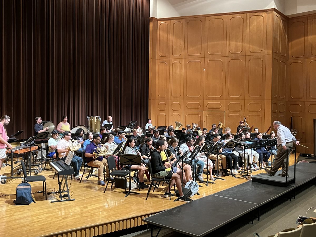 Northwestern State University of Louisiana’s Wind Symphony rehearses for performance featuring The Boston Brass, conducted by Anthony Pursell, with guest conductor Paula Crider.
