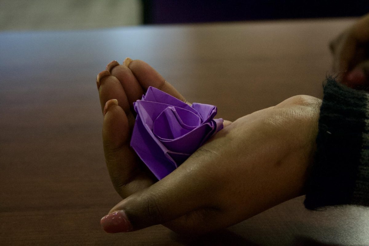 Follow along to see the process of building an origami rose.