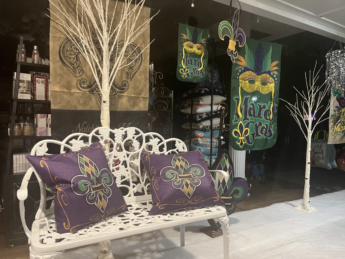 Fall in love with Mardi Gras through the green, purple and gold decoration.  