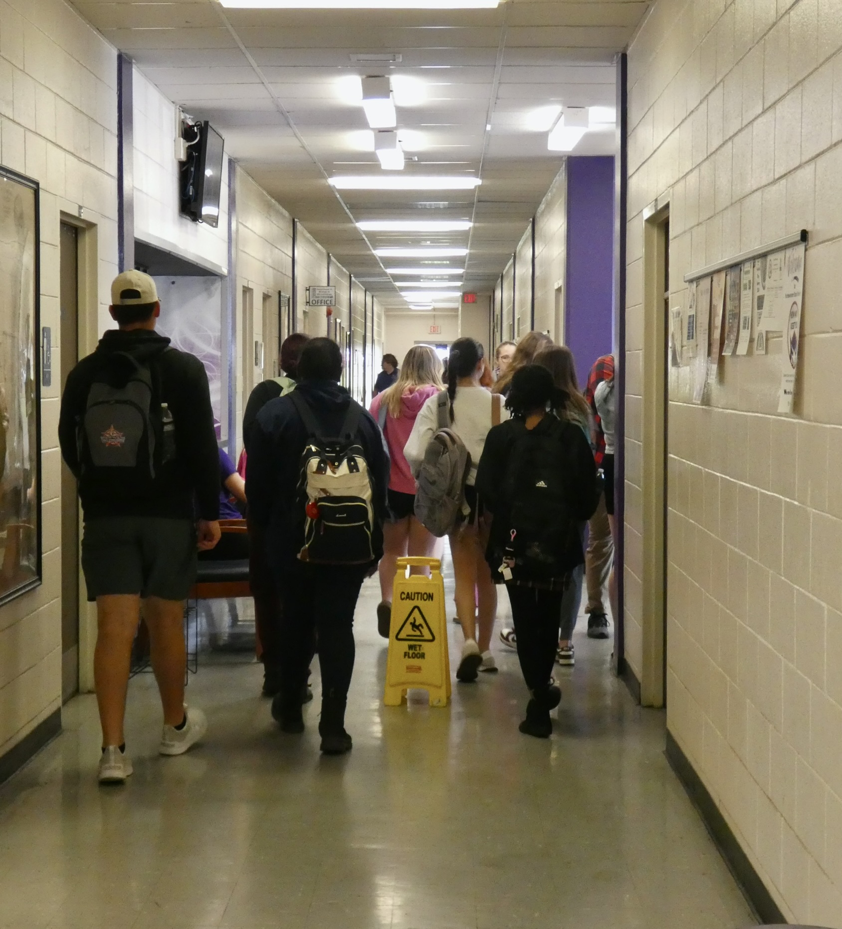 Current students continue to follow their daily schedule and move from class to class.