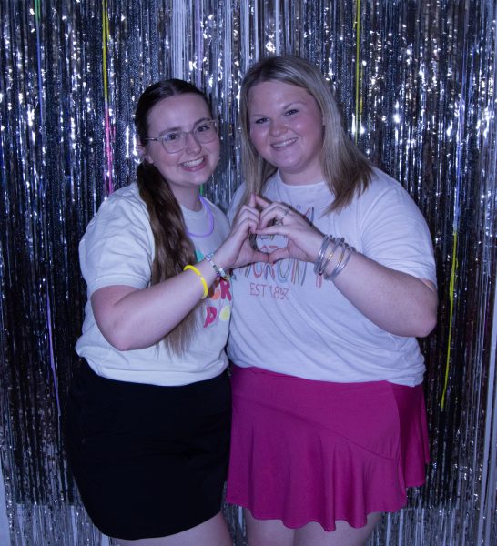 Alpha Omicron Pi (AOII) sisters pose by a backdrop at one of their spring continuous open bidding (COB) events, Just Dance w/ Alpha O.

From L to R:
Julie Prince, vice president of membership recruitment for Kappa Chi AOII

Kami Desidere, freshman membership integrity coordinator for Kappa Chi AOII