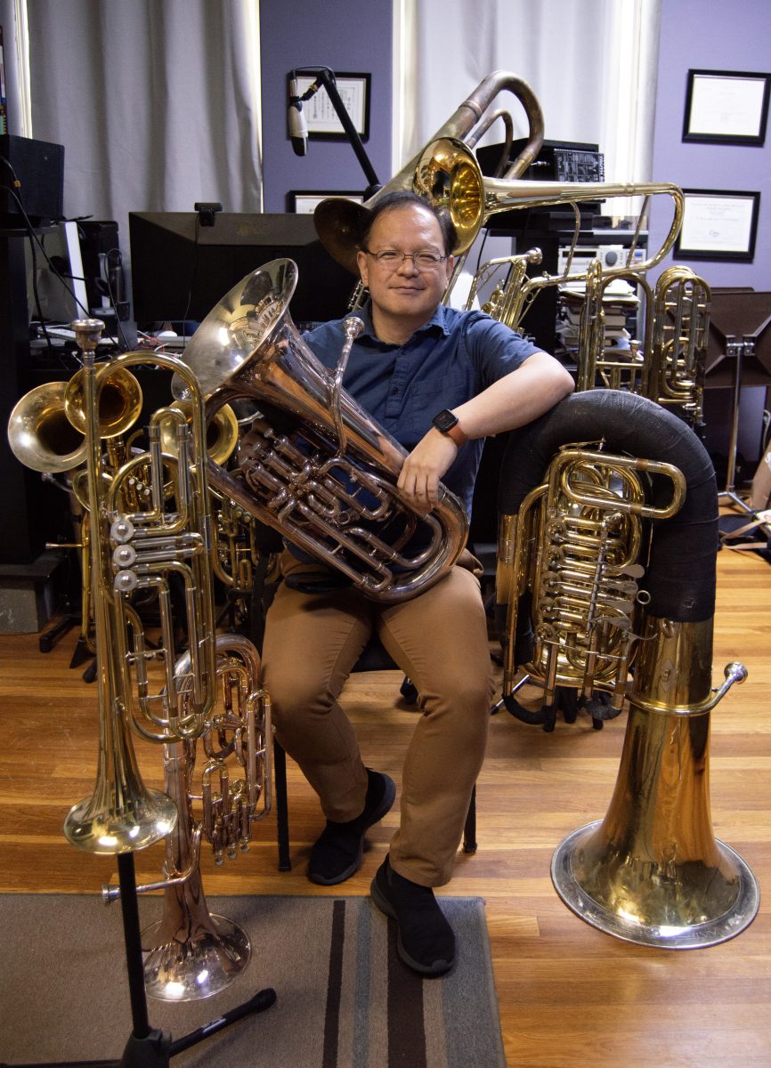 Masahito Kuroda smiles proudly alongside his instruments, as he has shared with students some advice that's helped him get to where he is today.