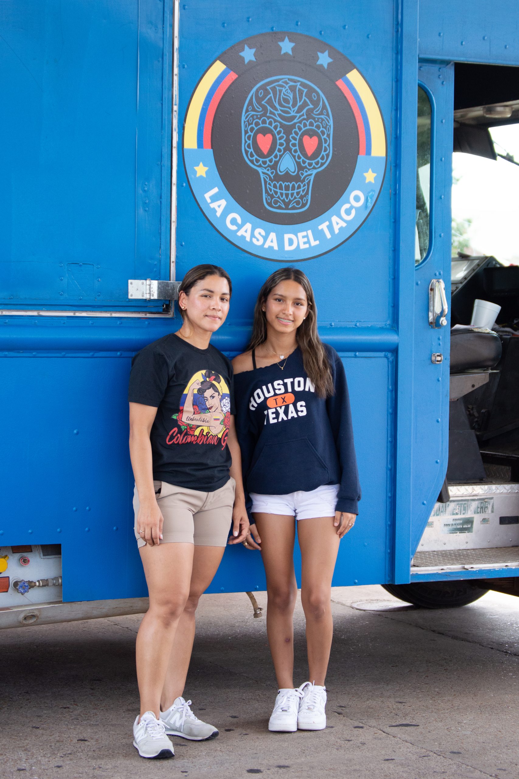 Marcela Restrepo stands with her daughter, Isabella Restrepo, who was 8 years old when the business first opened.