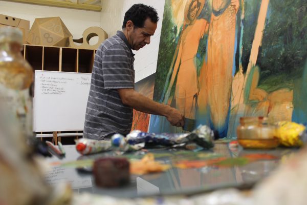 Edgar Cano continues working on his next art piece. 