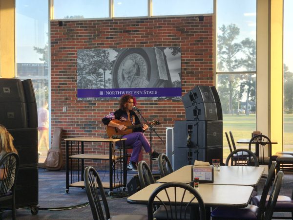 R&B and Reality TV music artist Ysa serves up some sweet music while NSU students listen at Iberville Dining Hall.