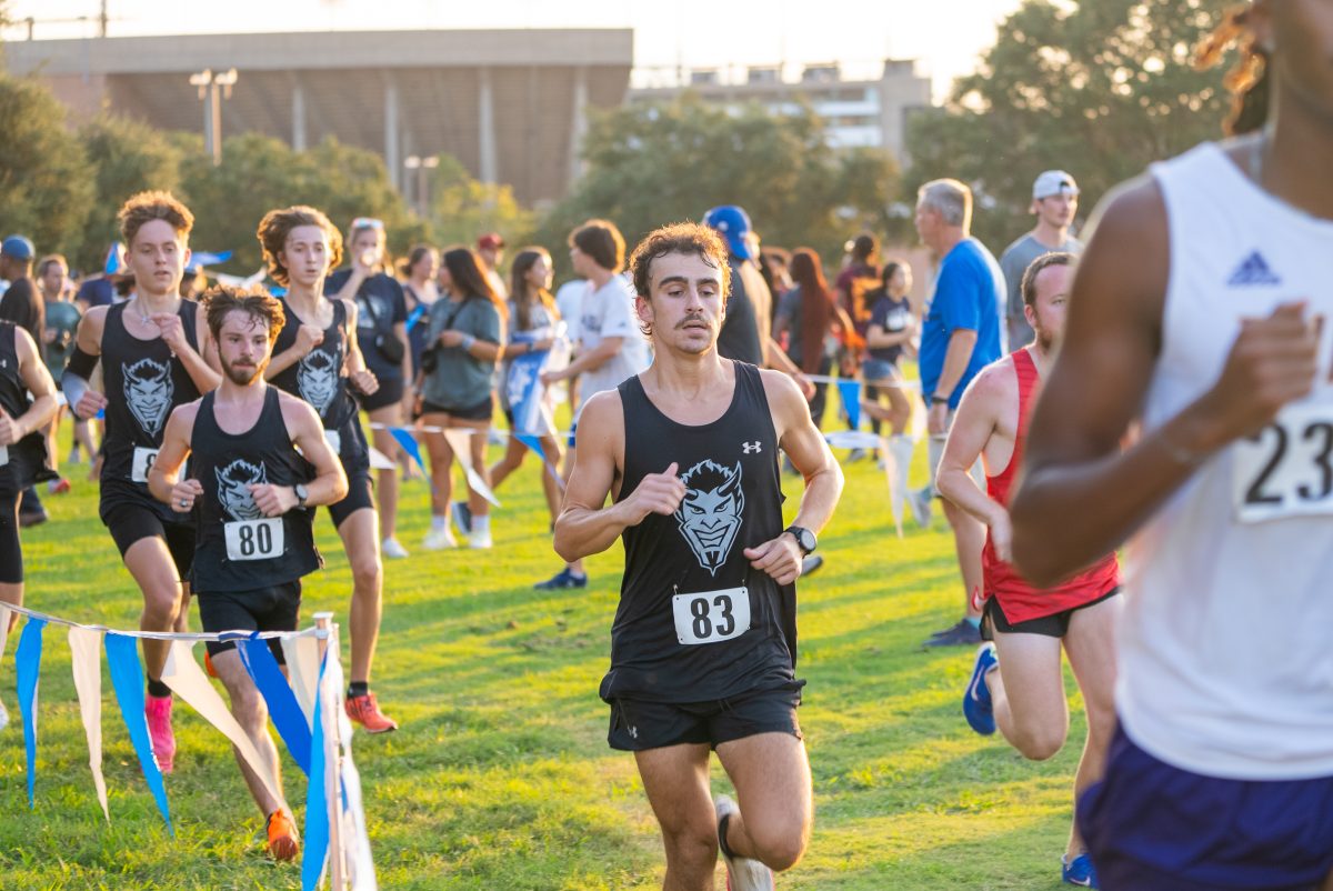 Men's cross-country newcomers follow closely behind freshman Owen Rue in the 4-mile at the Rice Invitational Meet on Friday, Sep. 13 in Houston, Texas.