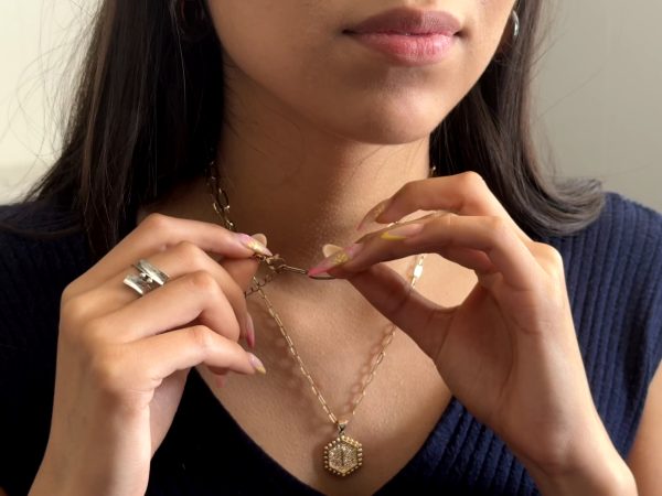 Isabel Juarez Rubio, The Current Sauce's Arts and Living editor, shows how she styles her gold and silver jewelry.