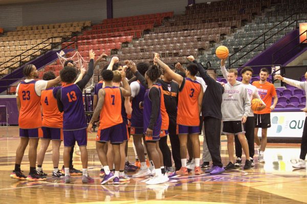 Demon men's basketball practice ahead of their season, and look forward to the holiday toy drive.