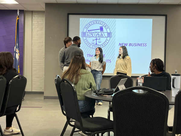 Student Government Association President Terrell Woodard Jr. sworn in three new senators: (L-R) Matthew Bailey, Megan Franchino and Ardyn Jardell.