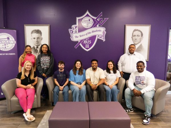 SGA President Madysen Morgan and Vice President Chris James are accompanied by some of the members of the newly elected senate.