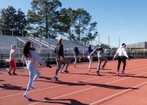 The Demon Track & Field team works hard in preparation for the upcoming SLC indoor conference meet.