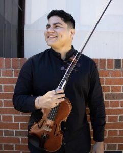 Josias Ramos, violin performance major, has been a student at NSU for five years and will be graduating in Spring 2025