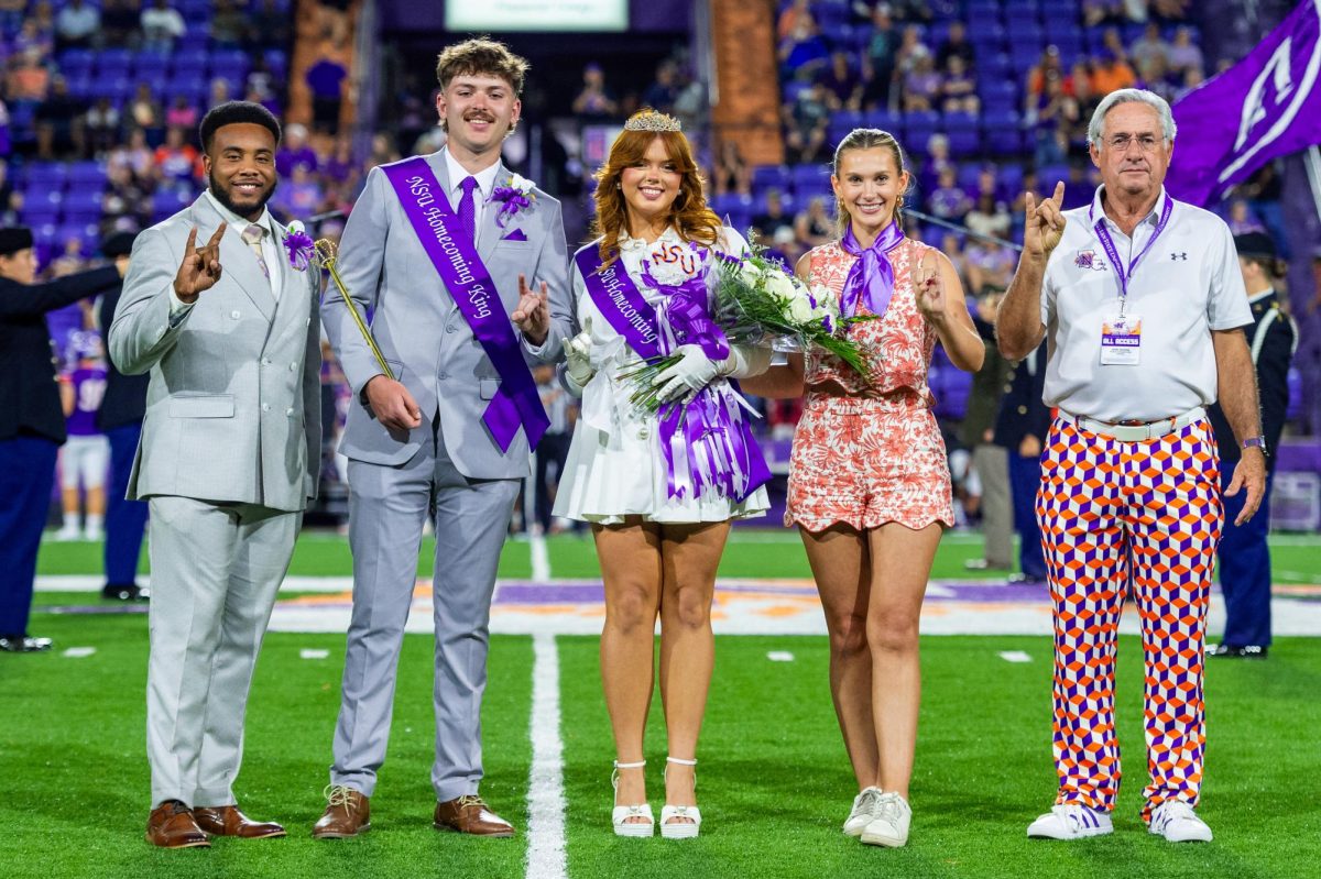 NSU's 2024 homecoming king and queen hand over the crown to 2025's royalty. Photo by Chris Reich.