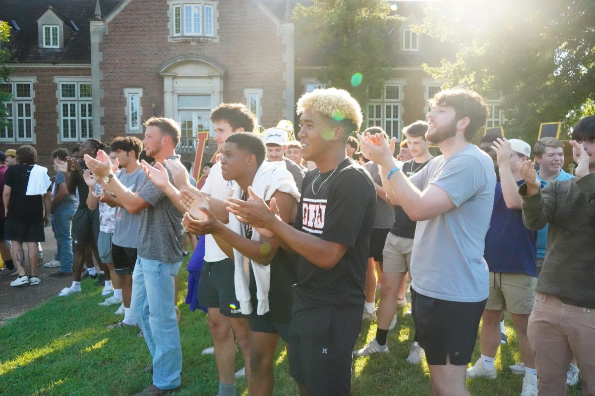IFC members clap for their new brothers at bid day, the final day of recruitment week. 