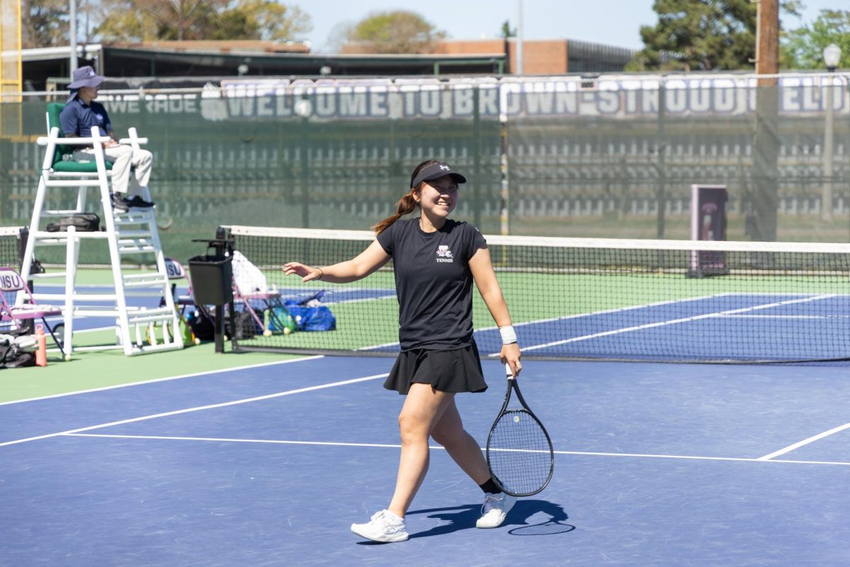 The Northwestern State University Lady Demons Tennis team competes in a doubles match against Texas A&M University-Corpus Christi.