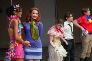 Students participate in the Monster Ball costume contest.